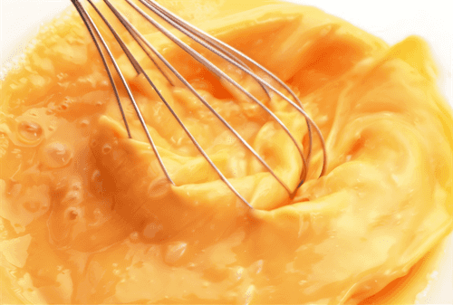 Scrambled eggs with red pepper